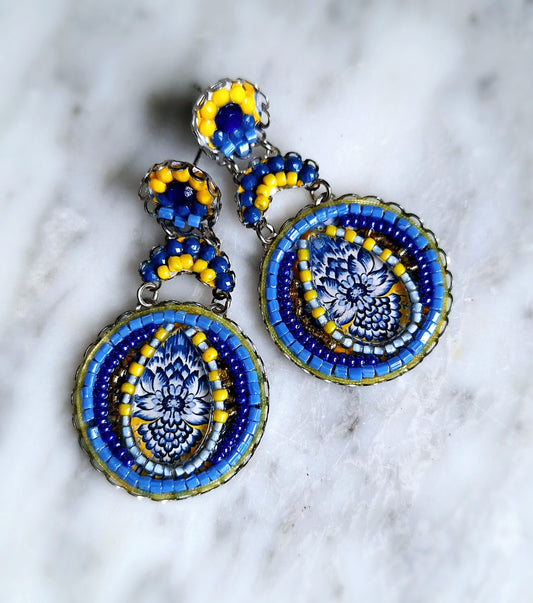 Large blue and yellow beaded earrings