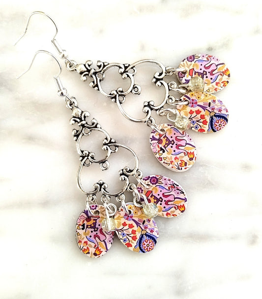 Silver coloured chandelier earrings with tapestry dangles